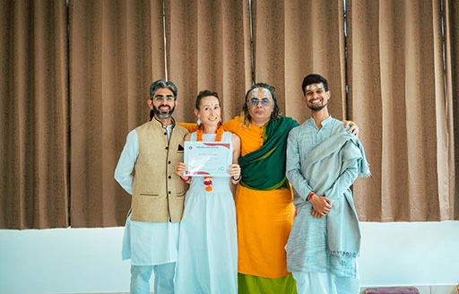 Corrine Germann with her 200-Hour Kundalini Yoga Teacher Training Certification at Nirvana Yoga School India